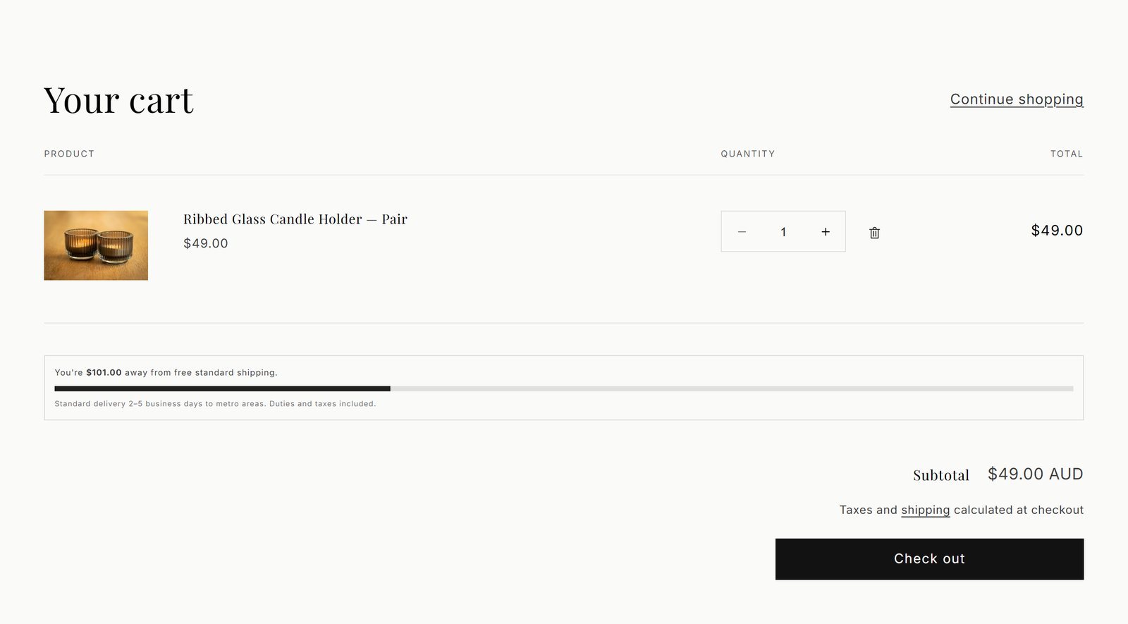 The same cart showing progress toward free shipping and a delivery estimate